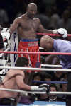 Evander Holyfield (standing) against John Luiz on August 12,2000